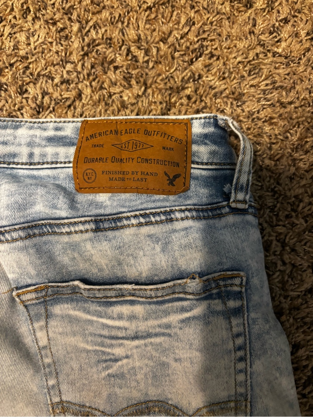 American Eagle Outfitters Light Blue Washed Denim Jeans with Leather Patch